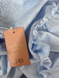 DEFECT | Pace Puffy Sleeve Romper Dress in Pastel Blue in XXS DEFECT | Pace Puffy Sleeve Romper Dress in Pastel Blue in XXS