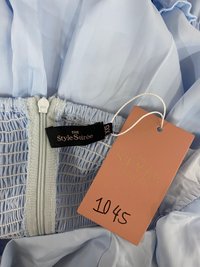 DEFECT | Pace Puffy Sleeve Romper Dress in Pastel Blue in XXS DEFECT | Pace Puffy Sleeve Romper Dress in Pastel Blue in XXS