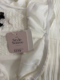 DEFECT | Petrine Pleat Sleeved Romper Dress in White in XS DEFECT | Petrine Pleat Sleeved Romper Dress in White in XS