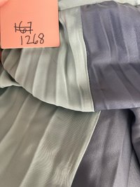DEFECT | Cerine Colourblock Pleat Romper Dress in Teal x Navy in XS DEFECT | Cerine Colourblock Pleat Romper Dress in Teal x Navy in XS