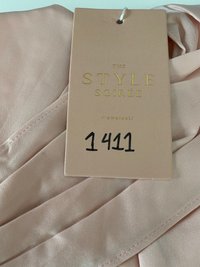 DEFECT | Trexie Toga Satin Romper Dress in Pastel Pink in XS DEFECT | Trexie Toga Satin Romper Dress in Pastel Pink in XS