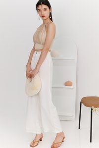Peylyn Pleated Halter Top in Champagne Yellow Peylyn Pleated Halter Top in Champagne Yellow