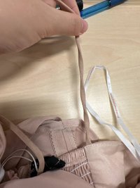 DEFECT | Colette Cross Back Romper Dress in Light Pink DEFECT | Colette Cross Back Romper Dress in Light Pink