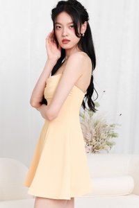 Clarine Cross Back Romper Dress in Canary Yellow