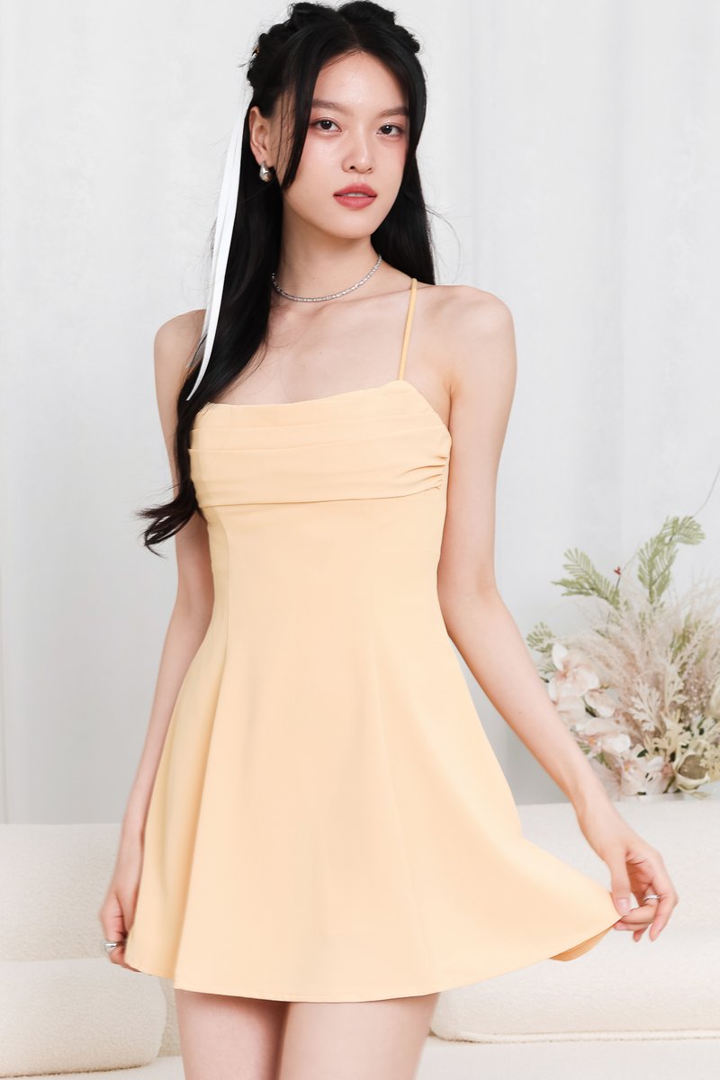 Clarine Cross Back Romper Dress in Canary Yellow
