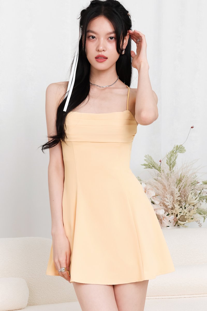 Clarine Cross Back Romper Dress in Canary Yellow
