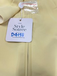 DEFECT | Brynn Bow Sleeveless Top in Light Yellow in XS DEFECT | Brynn Bow Sleeveless Top in Light Yellow in XS