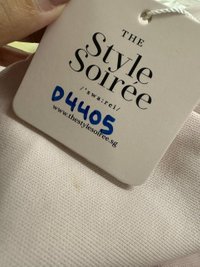 DEFECT | Reyla Ribbon Embroidered Hoodie in Light Pastel Pink in XS DEFECT | Reyla Ribbon Embroidered Hoodie in Light Pastel Pink in XS