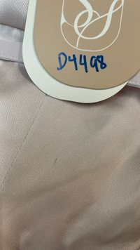 DEFECT | Peycie Puffy Sleeve Romper Dress in Lilac Pink in XS DEFECT | Peycie Puffy Sleeve Romper Dress in Lilac Pink in XS