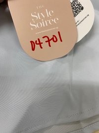 DEFECT | Tenla Twist Knot Cross Back Babydoll Top in Ice Blue XXS DEFECT | Tenla Twist Knot Cross Back Babydoll Top in Ice Blue XXS