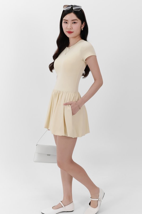 DEFECT | Serla Sleeved Bubble Romper Dress in Pastel Yellow in M