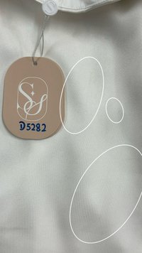 DEFECT | Peycie Puffy Sleeve Romper Dress in Pearl White in XS DEFECT | Peycie Puffy Sleeve Romper Dress in Pearl White in XS