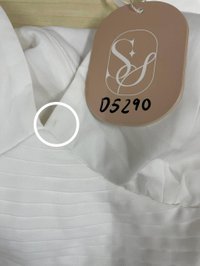 DEFECT | Paitlyn Pleated Jumpsuit in White in S