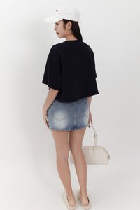 Audrey Asymmetrical Mid Waist Denim Skorts in Light Wash