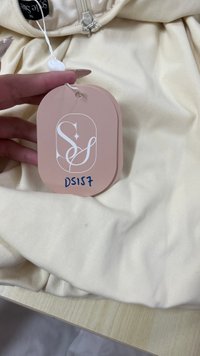 DEFECT | Serla Sleeved Bubble Romper Dress in Pastel Yellow in M