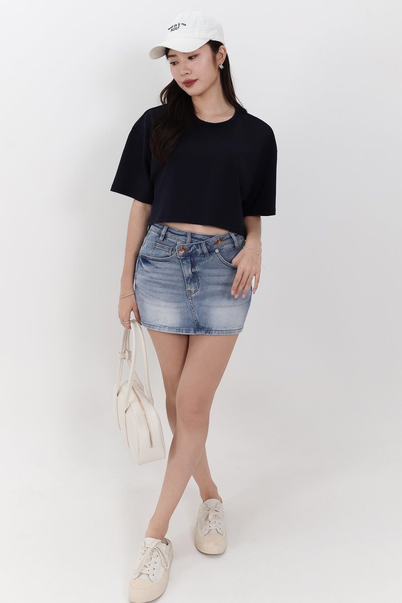Audrey Asymmetrical Mid Waist Denim Skorts in Light Wash