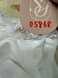 DEFECT | Leora Lace Offshoulder Top in White in M