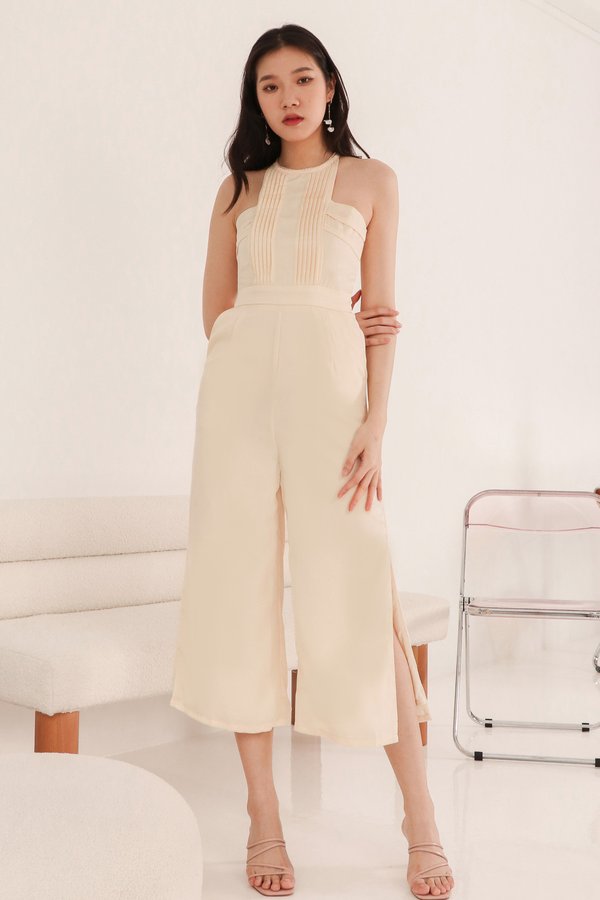 DEFECT | Perl Pleated Halter Jumpsuit in Pastel Yellow in XS
